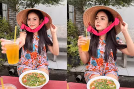 Cô gái Lào khiến fan Việt thích thú khi đội nón lá, uống trà đá lề đường