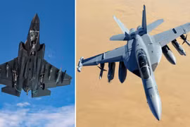 F-35C (trái) và EA-18G của Hải quân Mỹ. (Ảnh: M. Jackson/USN)