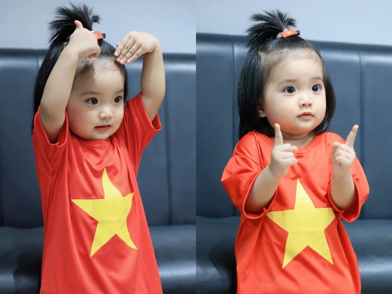 Con gái Khánh Thi - Phan Hiển mặc áo cờ đỏ sao vàng siêu cưng