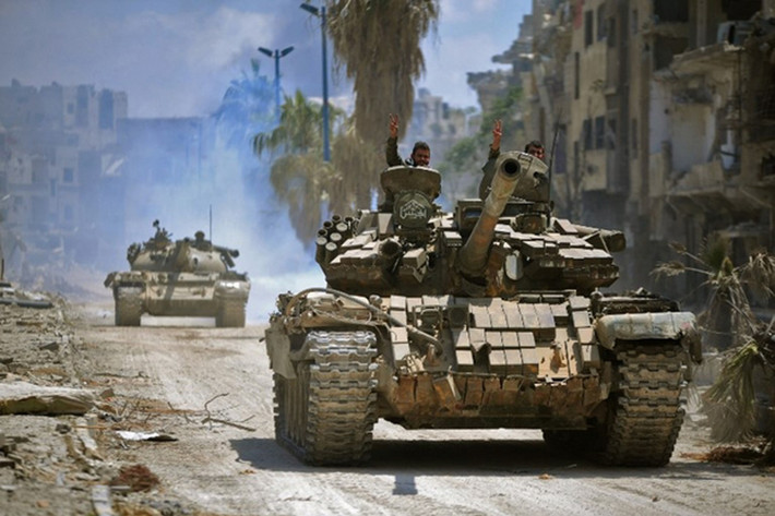 Sau tuyên bố của RT, Hãng Thông tấn nhà nước Syria (SANA) phủ nhận bất kỳ thỏa thuận nào giữa quân đội Syria và IS trong các quận ngoại ô miền nam Damascus. Nhưng SANA không đưa ra bình luận nào về việc ngừng bắn tạm thời. Ảnh: Middle East Eye.