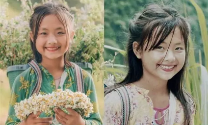 Phúng Phính tên thật là Mua Thị Dua, một cô bé thường xuyên ngồi ở dốc Thẩm Mã (Hà Giang) để cho thuê hoa, chụp ảnh.