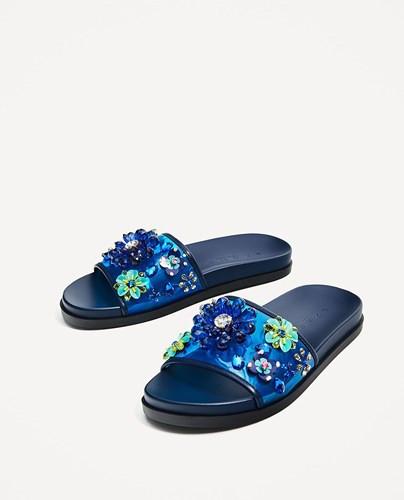 Zara là thương hiệu thời trang bình dân hàng đầu thế giới, bán đủ loại quần áo, giày dép, túi xách....