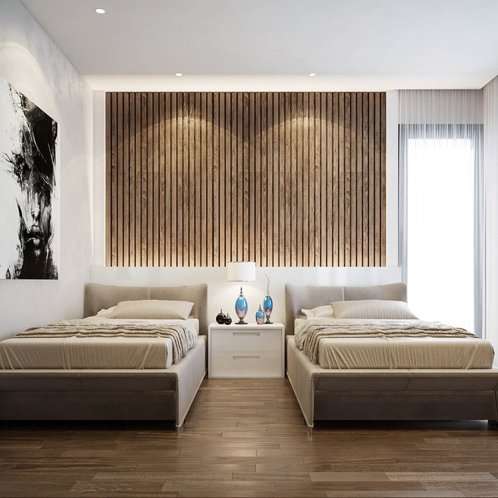 Cũng là cách trang trí tường đầu giường như vậy nhưng phòng ngủ thứ 3 có diện tích rộng hơn và đặt 2 chiếc giường ngủ dành cho hai cậu bé, con của chủ nhà.