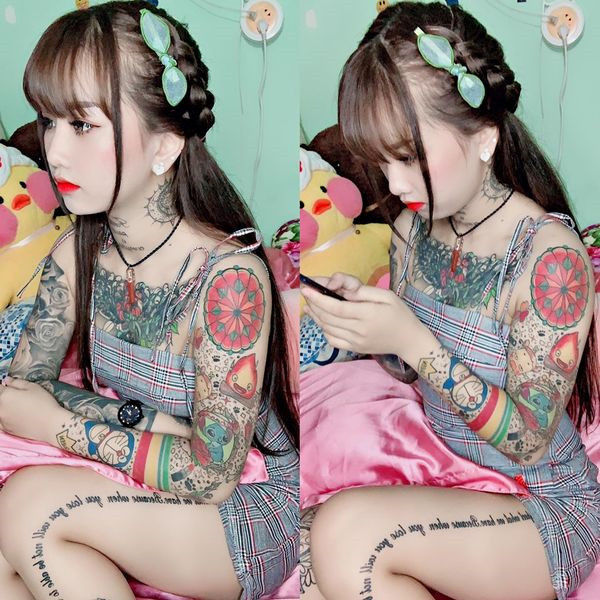 Cũng từ niềm đam mê xăm hình, cô gái An Giang đã tìm được “mảnh ghép” phù hợp, là một chàng trai hơn cô 8 tuổi, cũng là một thợ xăm và sở hữu không ít hình xăm hầm hố trên cơ thể. Ảnh: FBNV