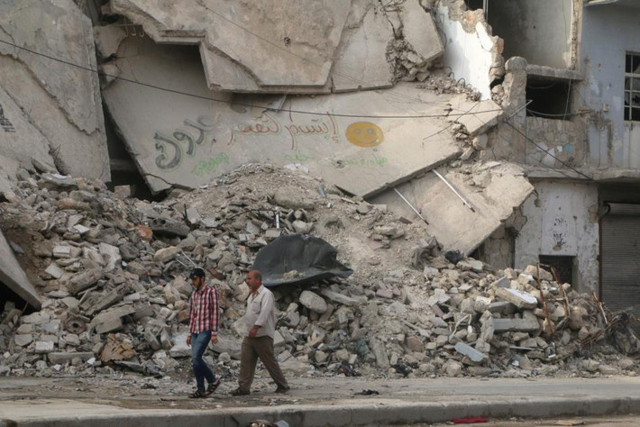 Cảnh tượng đổ nát sau các cuộc giao chiến ở Aleppo.