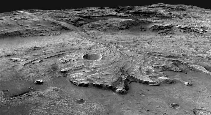 NASA đã đưa ra hai giả thuyết về sự hình thành của nó: có thể là kết quả của quá trình magma nguội đi sau một vụ phun trào núi lửa, hoặc có thể đã trải qua quá trình biến chất. Tảng đá này rộng khoảng 20 cm và có vẻ không thuộc về nền đá xung quanh, cho thấy nó có thể đã lăn xuống từ vành miệng hố. (Ảnh: NASA Science)