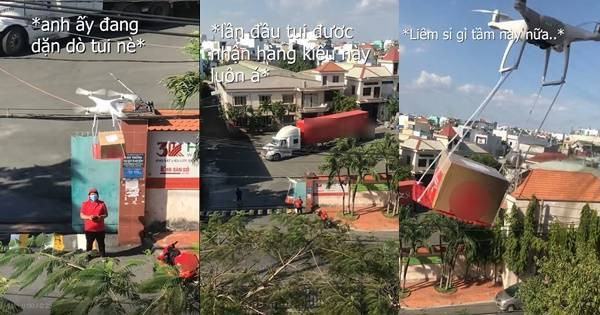 Đây là hình ảnh một nam shipper đang đứng dưới đường và điều khiển chiếc flycam vô cùng chuyên nghiệp. Trên đó, thùng hàng được buộc lại và "bay" về phía tòa nhà cô gái ở phía đối diện để giao hàng.