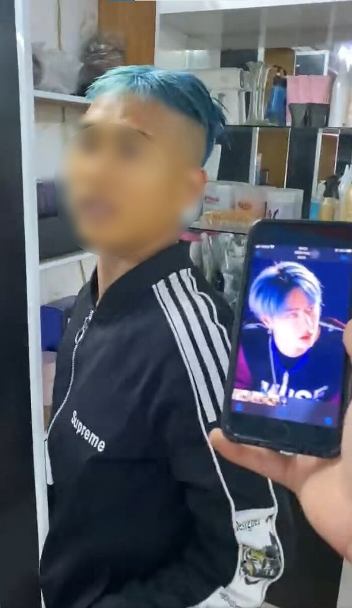 Mới đây, đoạn clip ghi lại cảnh một thanh niên đi làm tóc để đón năm mới nhưng không ưng ý khiến cư dân mạng xôn xao. Ảnh: chụp màn hình