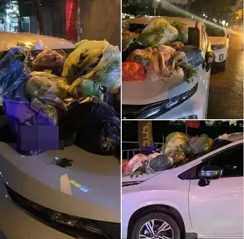 Thêm chiếc xe bị chất cả núi rác trên đầu vì đỗ xe chắn ngang.
