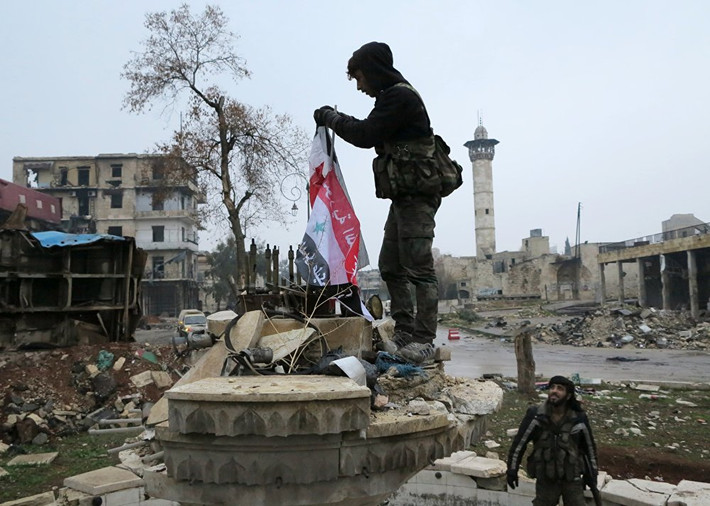 Lính Syria ở một quận phía đông mới được giải phóng. Ảnh Sputnik.