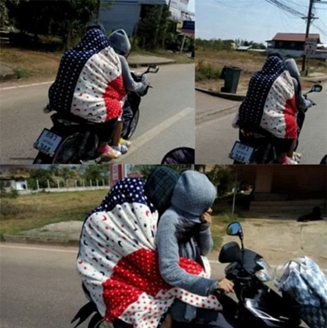 Đối mặt với đợt rét được đánh giá là lạnh nhất tính từ đầu mùa đông, nhiệt độ miền Bắc xuống thấp nhất đợt nên ai ra đường cũng trang bị khăn mũ, áo khoác kín mít.