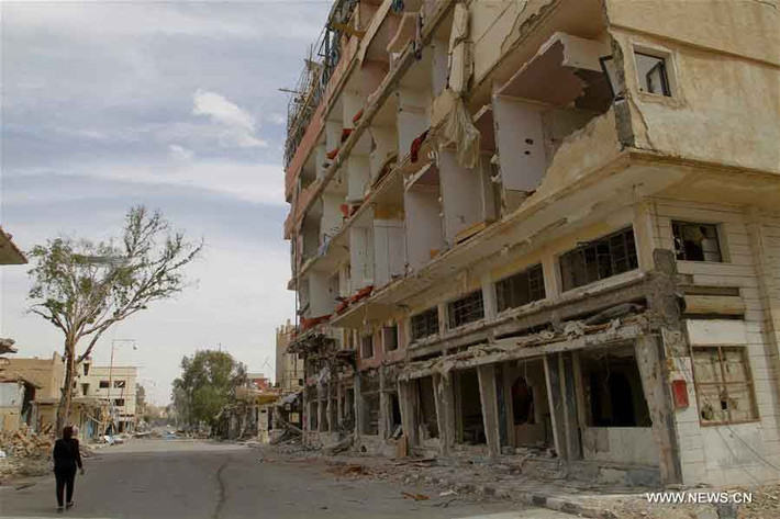 Những dãy nhà đổ nát sau những cuộc giao tranh, bắn phá vẫn còn hiện hữu ở Palmyra. Ảnh phóng viên chụp ngày 11/4/2016.