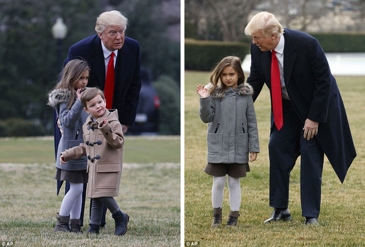 Hai cháu ngoại của Tổng thống Trump vẫy tay chào các phóng viên với cử chỉ không thoải mái. Ảnh Daily Mail