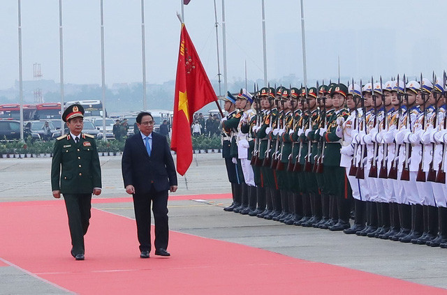 Thủ tướng Phạm Minh Chính đến dự Lễ khai mạc Triển lãm Quốc phòng quốc tế Việt Nam 2022. Ảnh: Trọng Đức - TTXVN