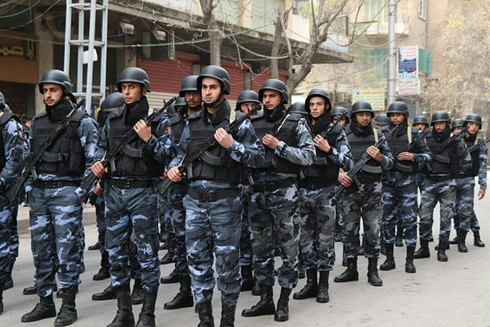 Hình ảnh lực lượng an ninh Syria bảo vệ thành phố Aleppo tham gia lễ diễu binh hôm 21/12. Nguồn ảnh: SANA.