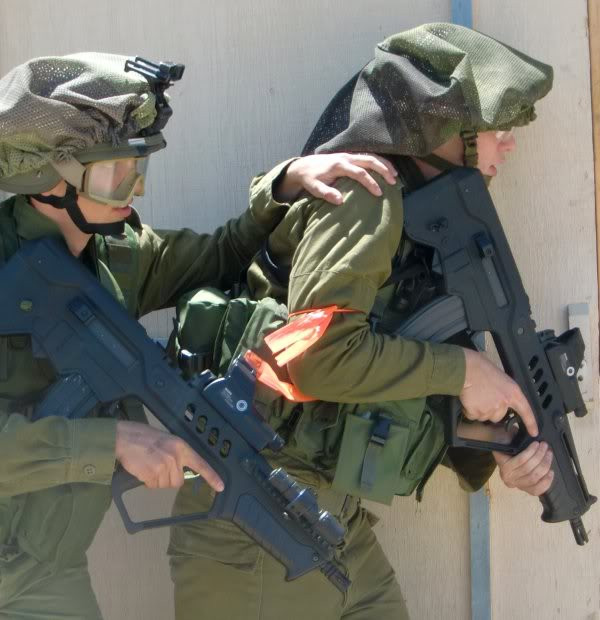 Quân đội Israel là một trong số rất ít nếu không muốn nói đây là đội quân duy nhất trên thế giới được trang bị kiểu mũ ngụy trang này trong biên chế quân phục chính quy của binh lính. Nguồn ảnh: Glock.