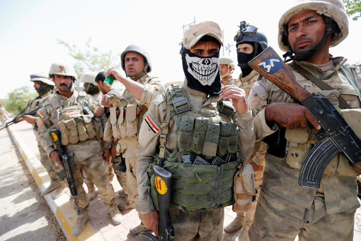 Các binh sỹ Iraq xuất hiện ở trung tâm thành phố Fallujah sau khi đánh tan tác IS, mở đường cho chiến dịch đánh vào thành trì Mosul.