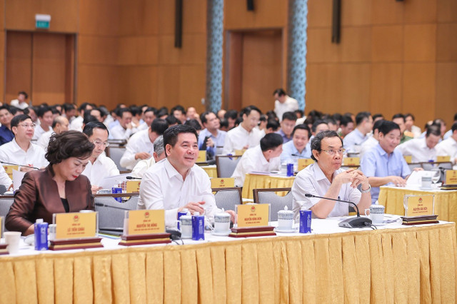 Các đại biểu tại hội nghị. Các đại biểu tại hội nghị.