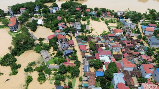 Hà Nội: Ngập lụt ở Chương Mỹ có thể kéo dài thêm hơn 10 ngày Ha Noi: Ngap lut o Chuong My co the keo dai them hon 10 ngay