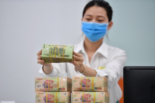Nhiều ngân hàng nâng lãi suất huy động vượt 7%/năm Nhieu ngan hang nang lai suat huy dong vuot 7%/nam