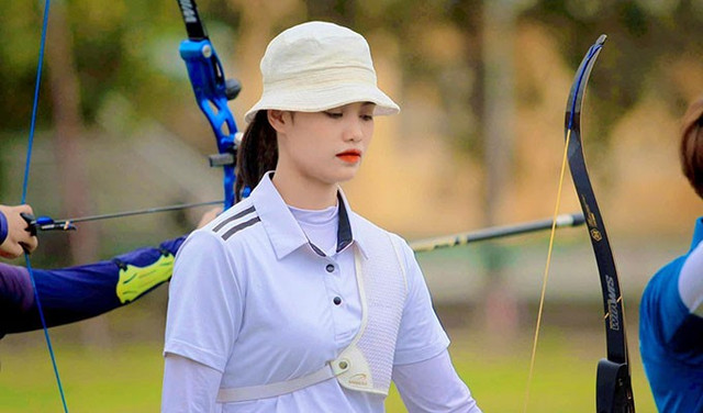 Nữ cung thủ Việt Nam khoe dáng cực 'cháy' trên bãi biển Nu cung thu Viet Nam khoe dang cuc 'chay' tren bai bien