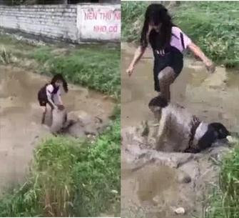 Nữ sinh bị bạn đánh đá dã man, nhấn cổ xuống bùn - Hình 2 Nu sinh bi ban danh da da man, nhan co xuong bun-Hinh-2