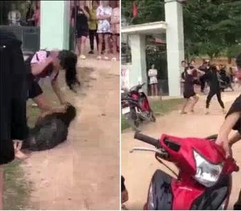 Nữ sinh bị bạn đánh đá dã man, nhấn cổ xuống bùn Nu sinh bi ban danh da da man, nhan co xuong bun