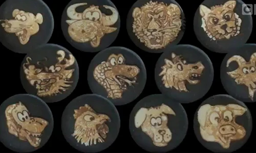 Họa sĩ Việt gây choáng khi vẽ 12 con giáp trên chảo 