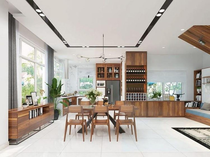 Nhà bếp biệt thự kiểu hiện đại sở hữu đặc trưng thường thấy là tích hợp tủ rượu, quầy bar… vào không gian bếp tạo sự thời thượng