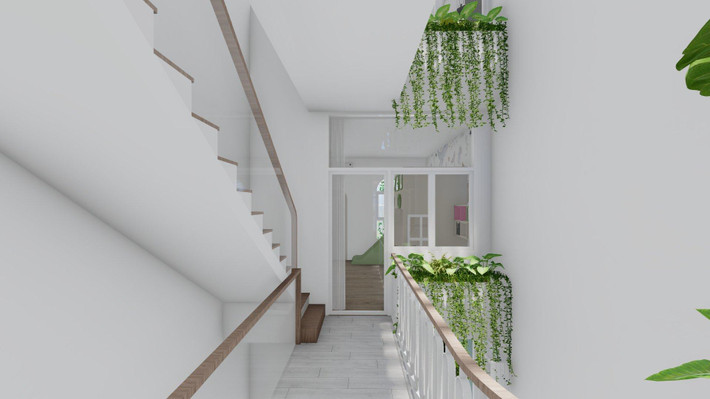 Góc giếng trời được bo cong mềm mại. Các phòng ngủ có cửa sổ hướng ra giếng trời nên luôn thông thoáng, dễ chịu.