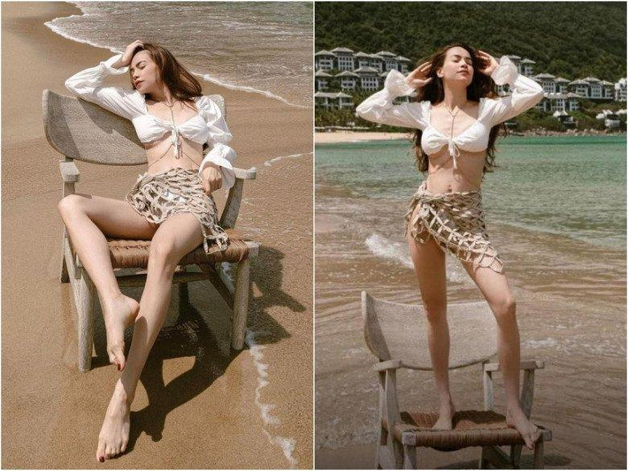 ết thân cùng combo áo croptop và quần bikini khi đi biển, Hồ Ngọc Hà còn xúng xính thêm chân váy lưới to bản nhằm khoe khéo eo thon hông nở và đôi chân dài miên man.
