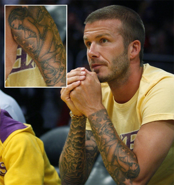 David Beckham in hình chân dung vợ yêu Victoria Beckham lên cánh tay như để nhắc nhở và kiềm chế bản thân trong những mối quan hệ khác giới.