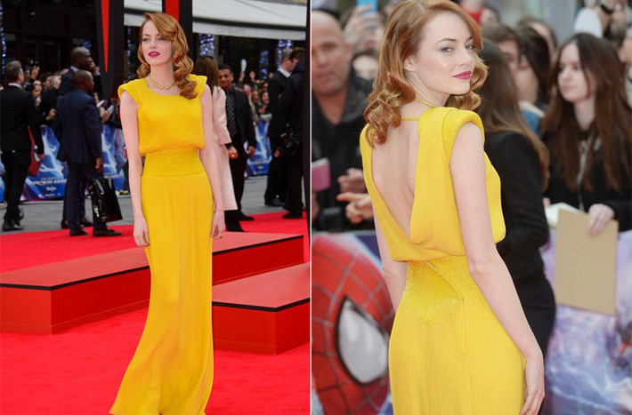 Emma Stone nổi bật với chiếc váy vàng hiệu Versace trong buổi công chiếu "The Amazing Spider-Man 2". Chiếc váy vàng, đôi môi đỏ và làn da trắng muốt khiến Emma nhận được rất nhiều lời khen.
