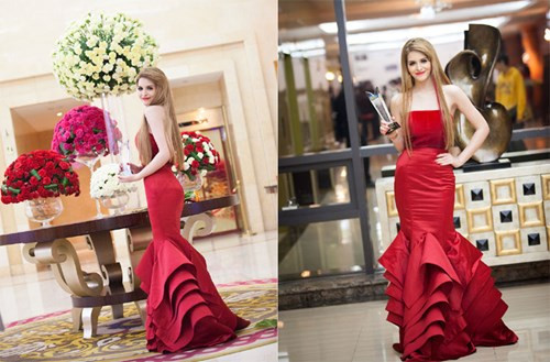 Diện chiếc váy đỏ lộng lẫy của NTK Hà Duy, người đẹp khoe vai trần gợi cảm.
