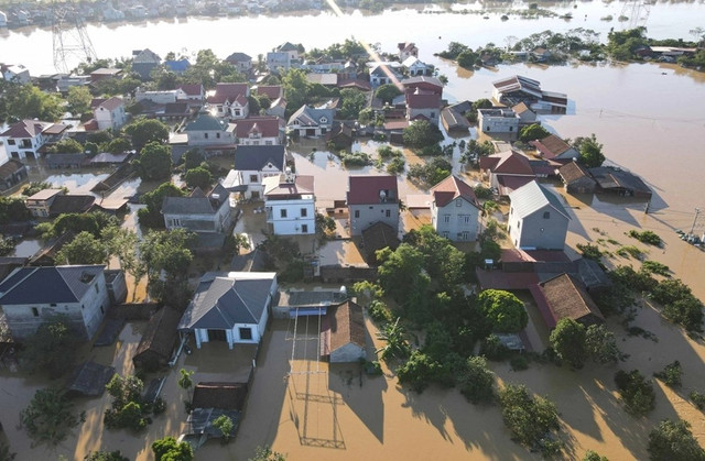 Do ảnh hưởng của hoàn lưu bão số 11 bão Matmo trên địa bàn tỉnh Bắc Ninh những ngày qua có mưa dông kéo dài, cùng với việc nước lũ từ thượng nguồn đổ về đã khiến mực nước sông Thương, sông Cầu dâng cao đỉnh điểm. a1.jpg