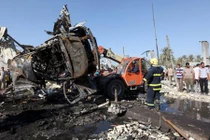 Hiện trường vụ đánh bom khiến 60 người chết ở Iraq