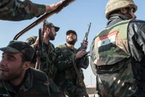 Quân đội Syria nhắm ngọn đồi trông xuống thị trấn chiến lược