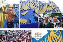 Giới trẻ Vinh ùn ùn đội mưa vượt tường Tiger cao nhất Việt Nam