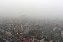 Hà Nội ngập trong sương mù, giao thông đi lại khó khăn