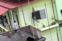 Cả xóm trọ hoảng loạn khi thấy hàng xóm treo lơ lửng ngoài hành lang