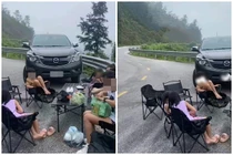 Bức xúc đại gia đình thản nhiên cắm trại giữa khúc cua nguy hiểm