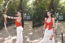 Danh tính hot girl triệu fans diện áo xẻ sâu đi bắn cung