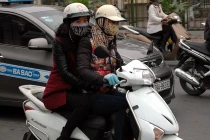 Hà Nội rét 9 độ, người dân kín mít khi ra đường 