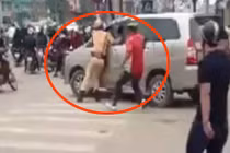 Lao xe vào cảnh sát rồi bỏ chạy khi bị kiểm tra vi phạm