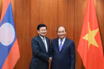 Chủ tịch nước và phu nhân lên đường thăm chính thức CHDCND Lào