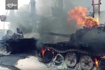 Tiếc hùi hụi dàn xe quân sự phiến quân thiêu hủy tại Douma