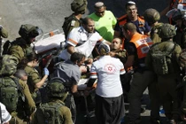 Chùm ảnh người Palestine cầm dao tấn công binh sĩ Israel