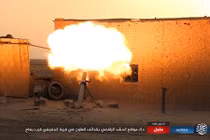 Ảnh: IS tấn công liều chết căn cứ Iraq gần biên giới Syria