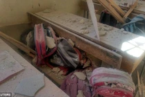 Hiện trường tan hoang vụ pháo kích trường học ở Aleppo