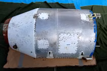 Ảnh vật thể nghi tên lửa Triều Tiên dạt vào bờ biển Nhật